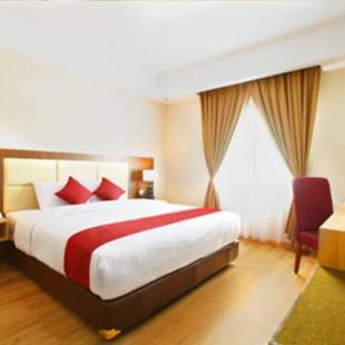 Фотографии гостиницы 
            Orchardz Hotel Bandara