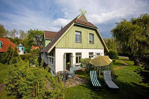 Фотография гостевого дома Ferienhaussiedlung Strandperlen Buchenhof 2c (Typ II)