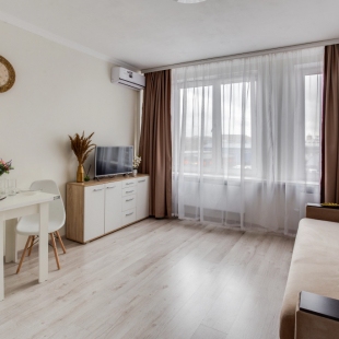 Фотография квартиры Апартаменты Уютная Студия с Диваном