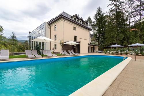 Фотография гостиницы Hotel IZVOARE Caciulata