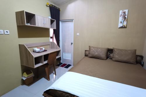 Фотография гостиницы OYO 90061 Melati House Syariah