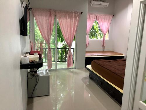 Фотография мотеля chillchill sangkhlaburi ห้องพักชิลล์ชิลล์