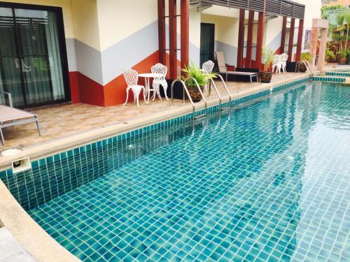 Фотография гостиницы Mei Zhou Phuket Hotel - SHA Plus