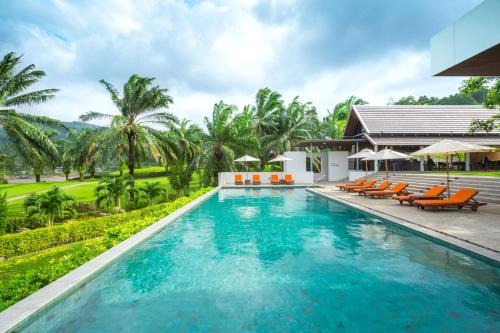 Фотография гостиницы Tinidee Golf Resort Phuket - SHA Extra Plus