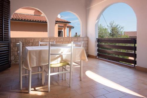 Фотография гостевого дома Apartments with a parking space Premantura, Medulin - 2228