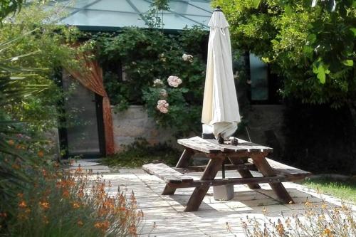 Фотография гостевого дома A comfortable rural space in beautiful gardens