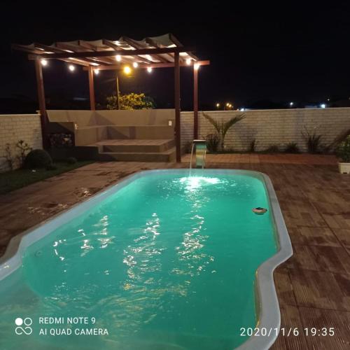 Фотография гостевого дома Casa de esquina aconchegante com vista do mar