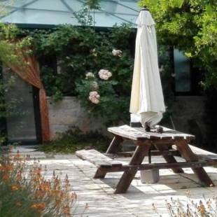 Фотографии гостевого дома 
            A comfortable rural space in beautiful gardens