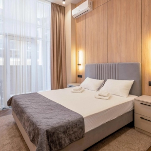 Фотография квартиры Апартаменты Светлана Парк ApartAmore с кухней