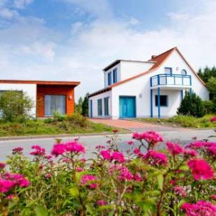 Фотографии гостевого дома 
            Ferienwohnungen Ostrea & Rugia