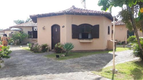 Фотография гостевого дома Chalé com 2 quartos a Beira Mar