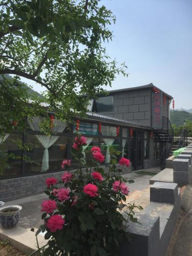 Фотография мини отеля Beijing Huanghuacheng Water Great Wall Derunju Guesthouse