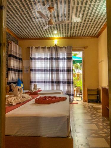 Фотографии гостевого дома 
            Mathiveri Thundi Inn