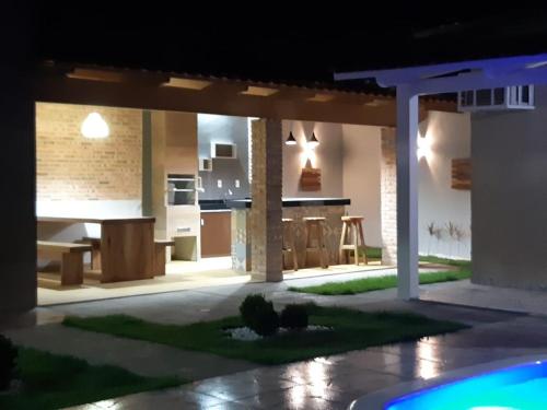 Фотография гостевого дома CASA com PISCINA no centro