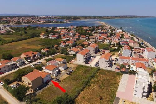 Фотография гостевого дома Apartments with a parking space Nin, Zadar - 11402