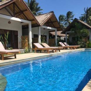 Фотографии гостиницы 
            Cozy Cottages Lombok