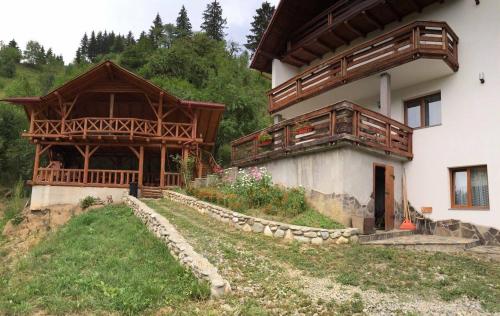 Фотография гостевого дома Pensiunea Pietrosul