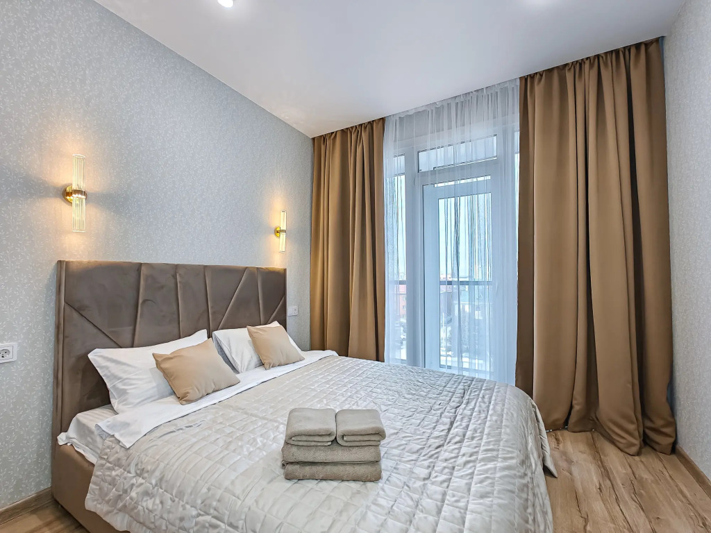 Фотография квартиры Апартаменты Stepanenkov с угловой гостиной на Комсомольском 6