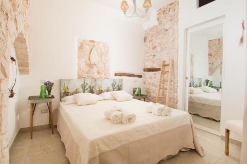 Фотография гостевого дома Manidibianco Apulian Relaxing Stay