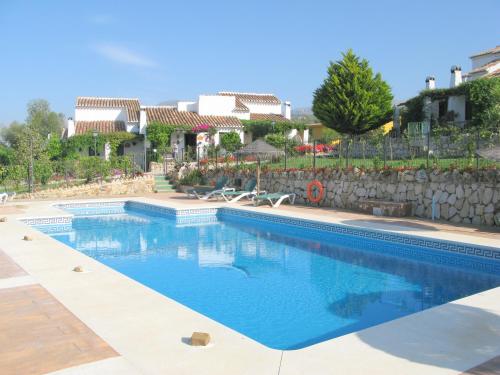 Фотография гостевого дома Cantueso Cottages