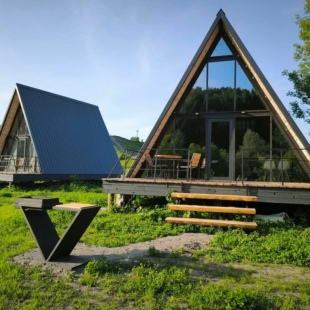 Фотография Коттеджа Шале двухэтажный А-фрейм с панорамным остеклением и террасой