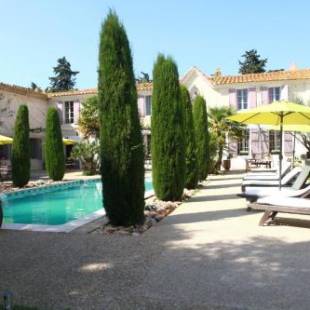 Фотографии гостевого дома 
            Maison de 2 chambres avec piscine partagee jardin clos et wifi a Saint Gilles