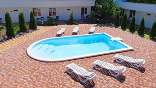 Фотографии гостевого дома 
            Белая Лебедь