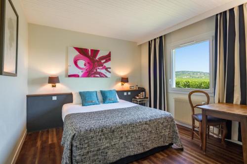 Фотография гостиницы Kyriad Prestige Beaune le Panorama