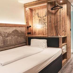 Фотографии гостиницы 
            BinderS Budget City-Mountain Hotel