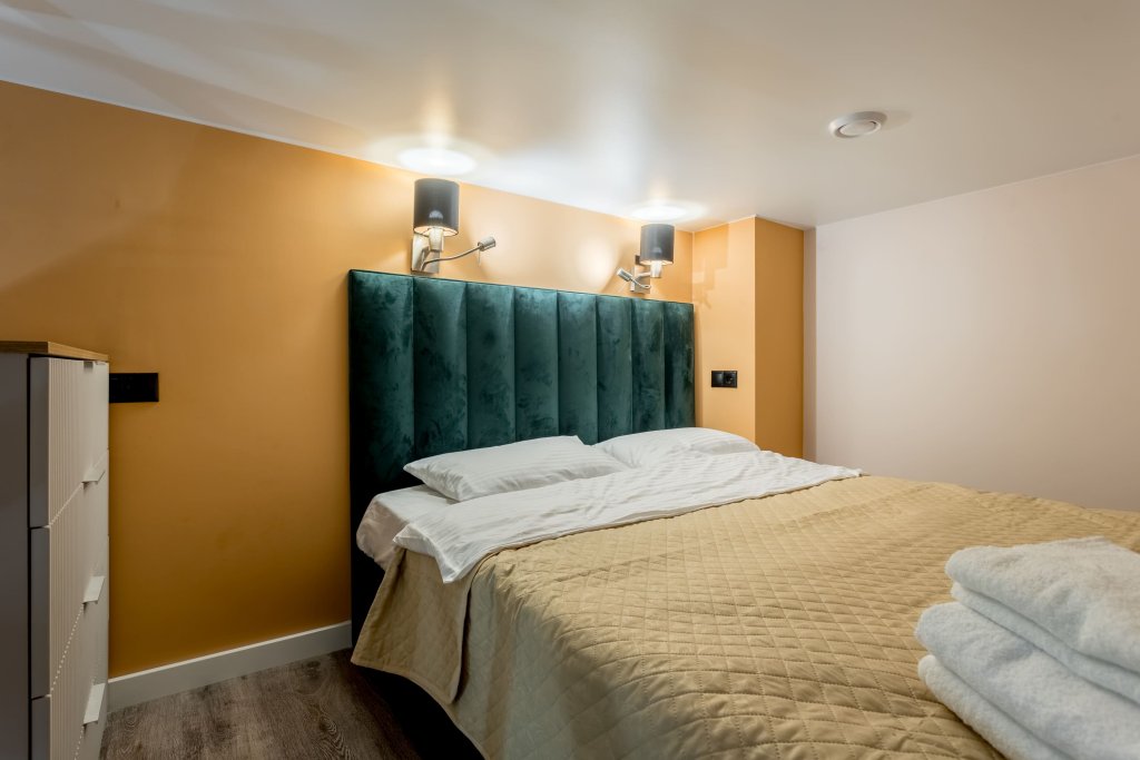 Фотография квартиры Апартаменты InHome24 Стильные двухуровневые апартаменты HomeCity