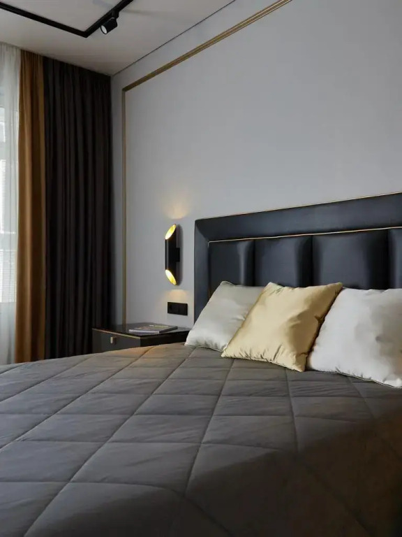 Фотография квартиры Апартаменты UzorApart Дизайнерская квартира у набережной, парковка, вид на закат