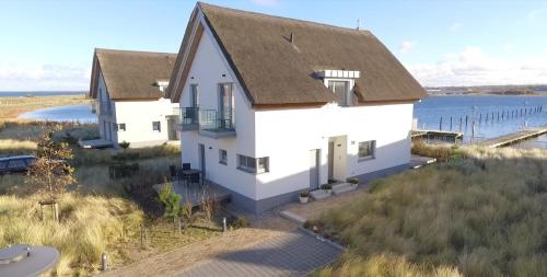 Фотография гостевого дома Ostsee - Reetdachhaus "Graswarder" im Strand Resort