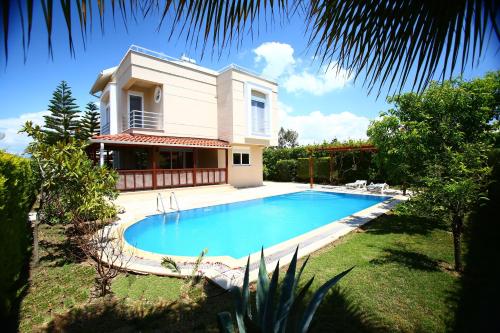 Фотография Коттеджа Paradise Town Villa Royal