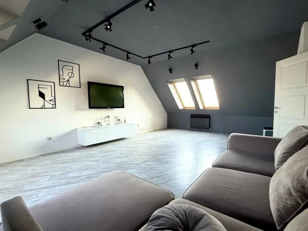 Фотография квартиры Квартира Неотель мансардная у Чернавского моста, Петровского сквера