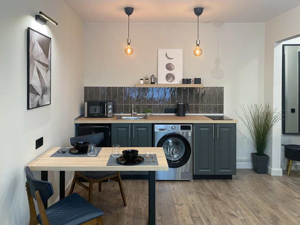 Фотография квартиры Апартаменты Unique Apart Юпитер рядом с Мариинским театром, КемГУ и Филармонией на Красной 12