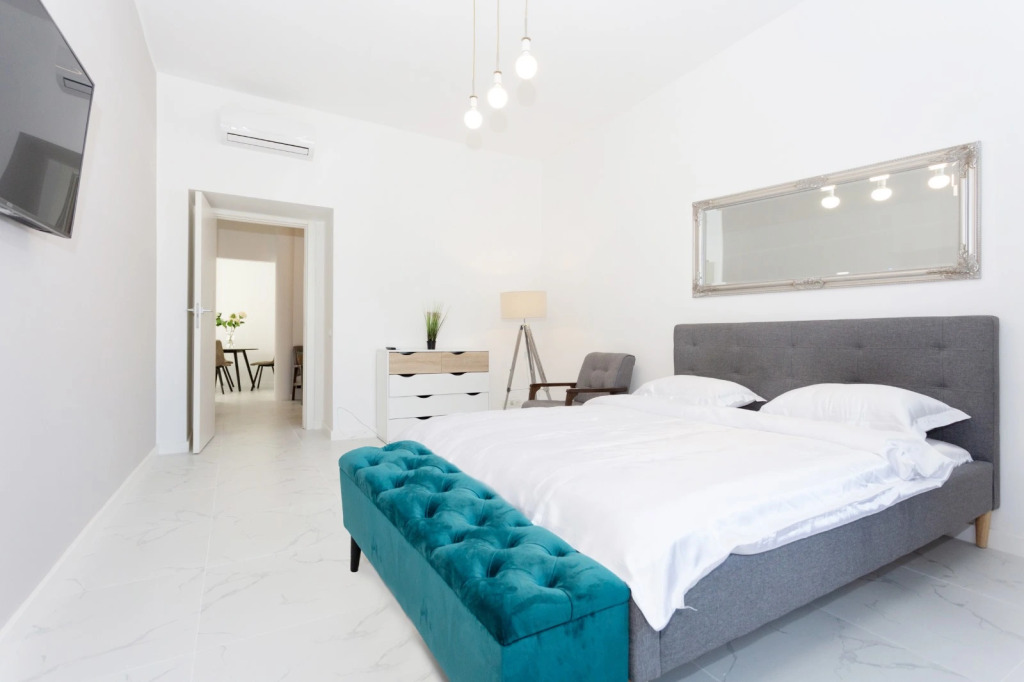 Фотография квартиры Апартаменты Стильные апартаменты с двумя спальнями в центре