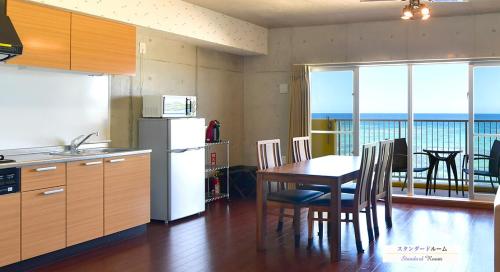 Фотография гостиницы Churaumi on the Beach Motobu