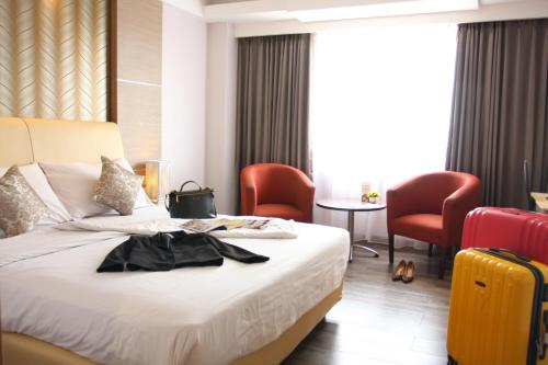 Фотография гостиницы Orchardz Hotel Industri Jakarta