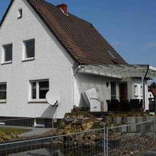 Фотографии гостевого дома 
            Modernes Ferienhaus der besonderen Art mit Garten