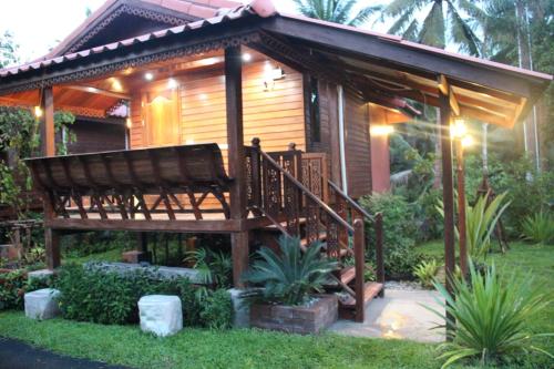 Фотография гостевого дома บ้านสวนในฝัน-ตลาดน้ำท่าคา