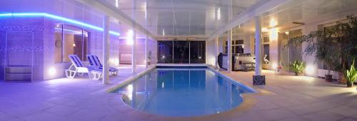 Фотография гостевого дома Au Charme du Lac Piscine & Spa