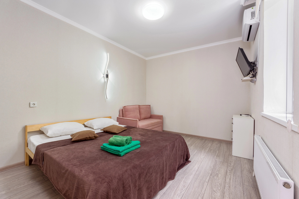 Фотография квартиры Апартаменты У Цветника от Rooms Apartments