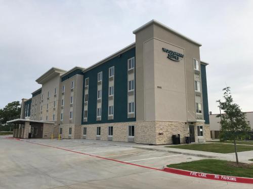 Фотография гостиницы WoodSpring Suites Dallas Plano Central Legacy Drive