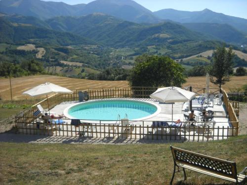Фотографии гостевого дома 
            Inviting Holiday Home in Serra Sant'abbondio with Garden