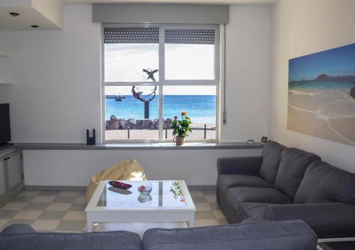 Фотография гостевого дома Duplex con vistas en primera linea de playa