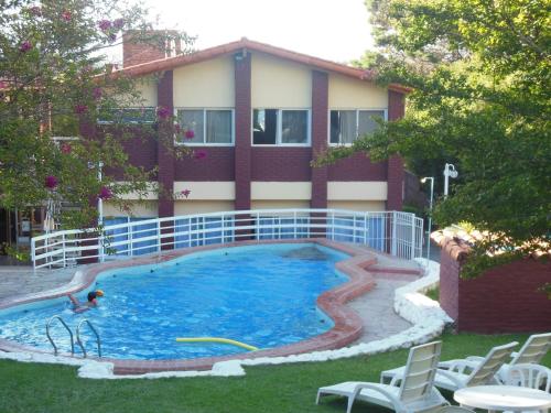 Фотографии гостиницы
Hotel Aoma Villa Carlos Paz