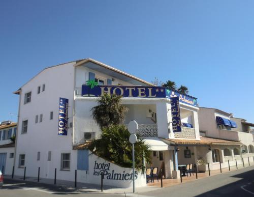 Фотография гостиницы Hotel Les Palmiers En Camargue