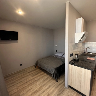 Фотография квартиры Квартира Уютная студия с видом на город