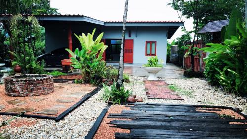 Фотография базы отдыха Baan Mali Lampang Homestay