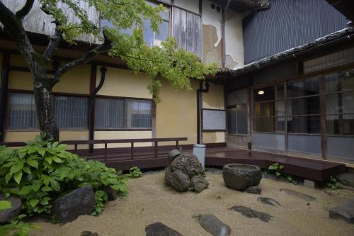 Фотографии гостевого дома 
            Sasayama Castle Guesthouse KOMEYA